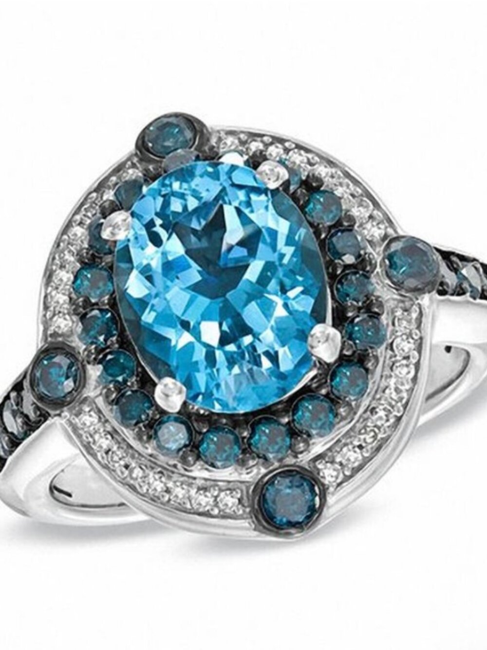 Oval Cut Blue Topaz and Diamond Ring